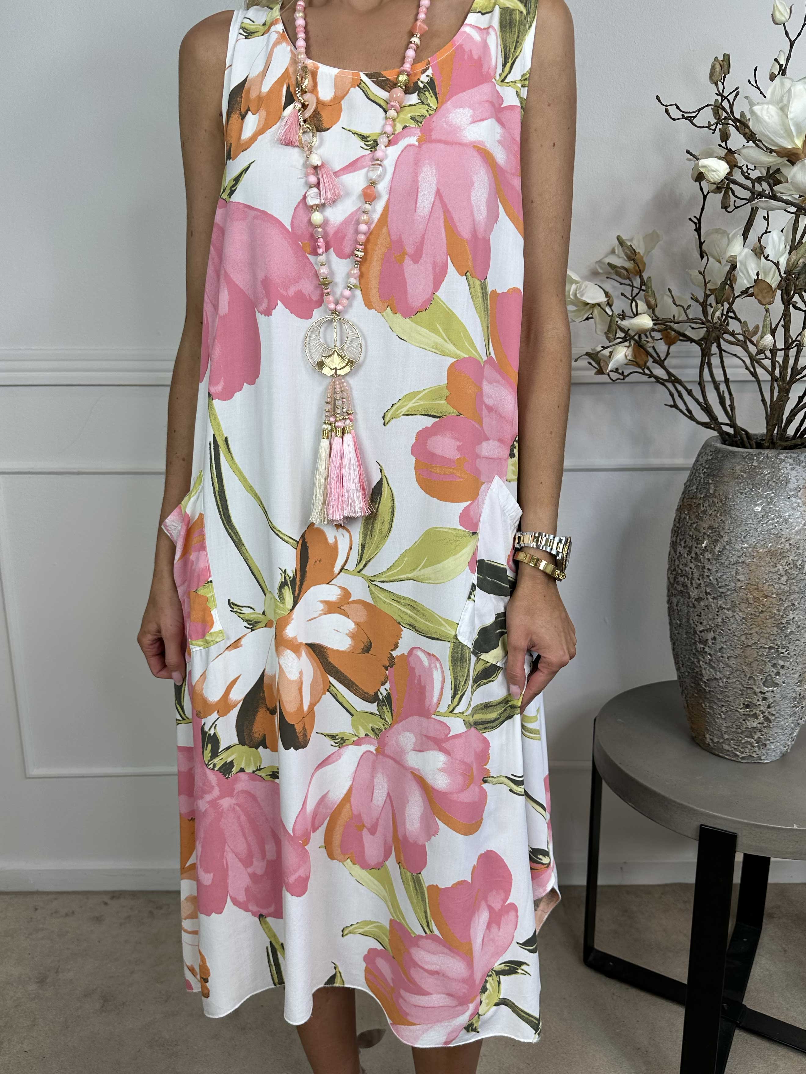 Kirsi - Söt blommig sommarklänning i viskos med fickor